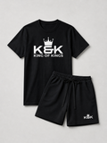 Black t-shirt and shorts set with 'K&K King of Kings' logo on a light gray background