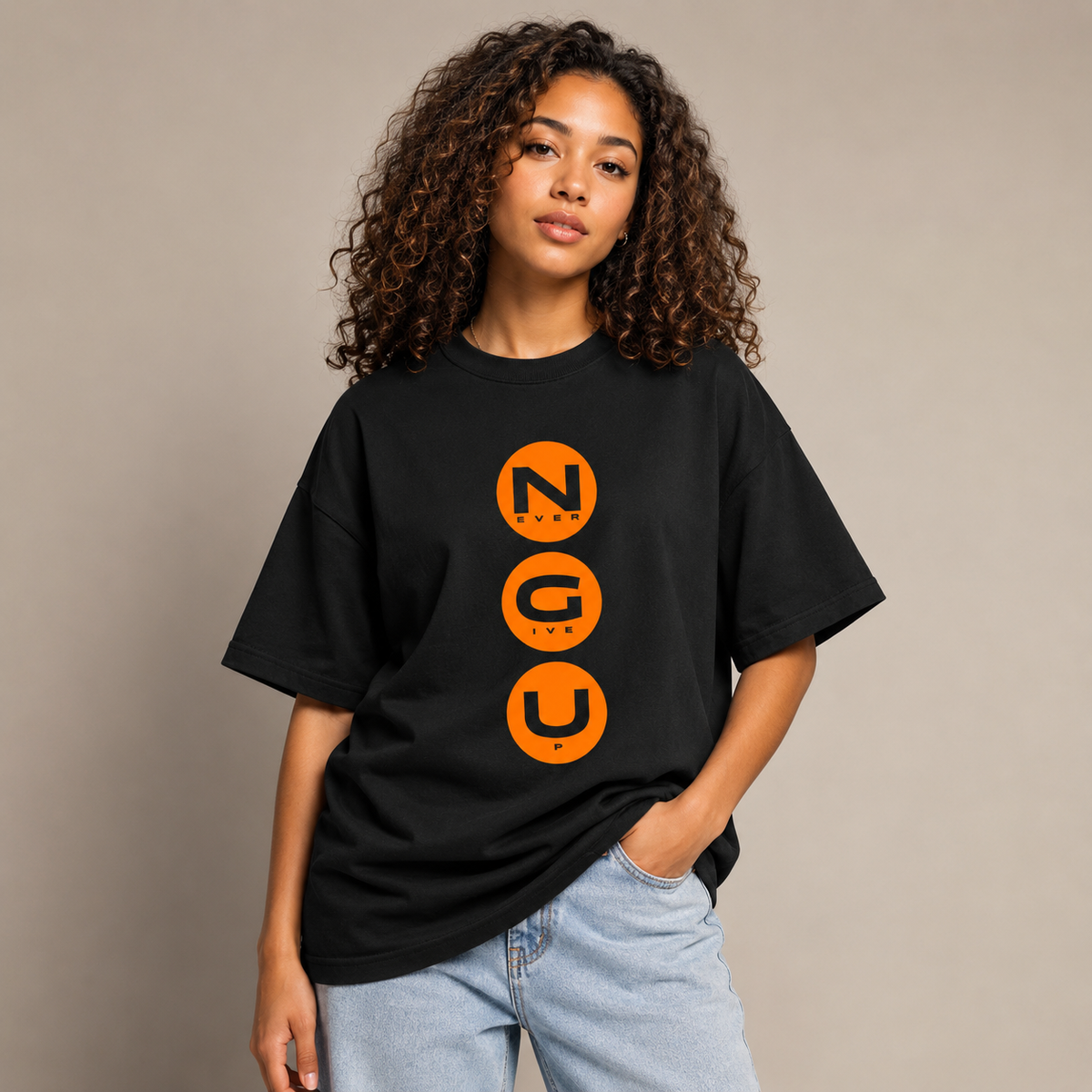 Black Never Give Up oversized unisex T-shirt with bold orange NGU graphic artwork.
