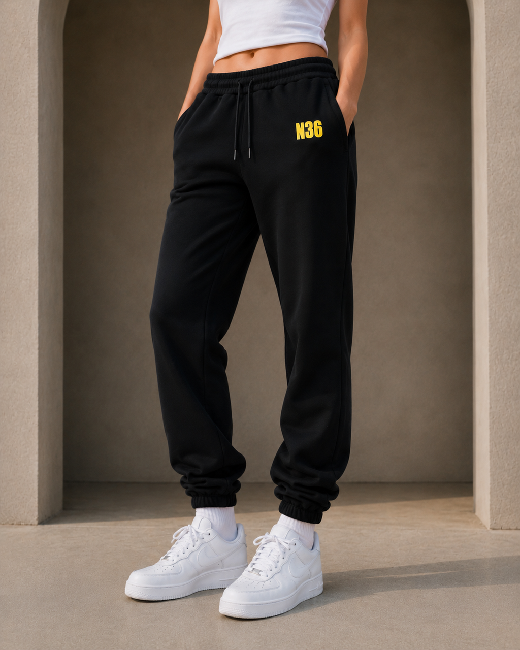 N36 unisex black trackpants with yellow thigh logo, elastic waistband and drawstring